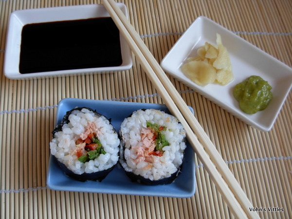 Salmon sushi with accompaniments