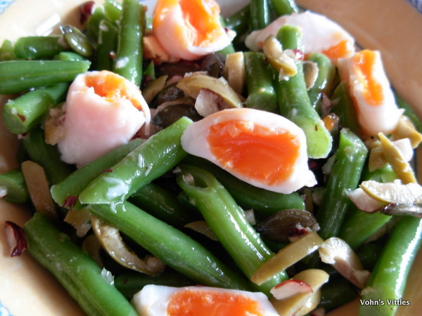Green bean and hazelnut salad with poached quails eggs