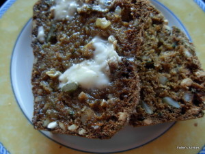 Spiced courgette loaf buttered